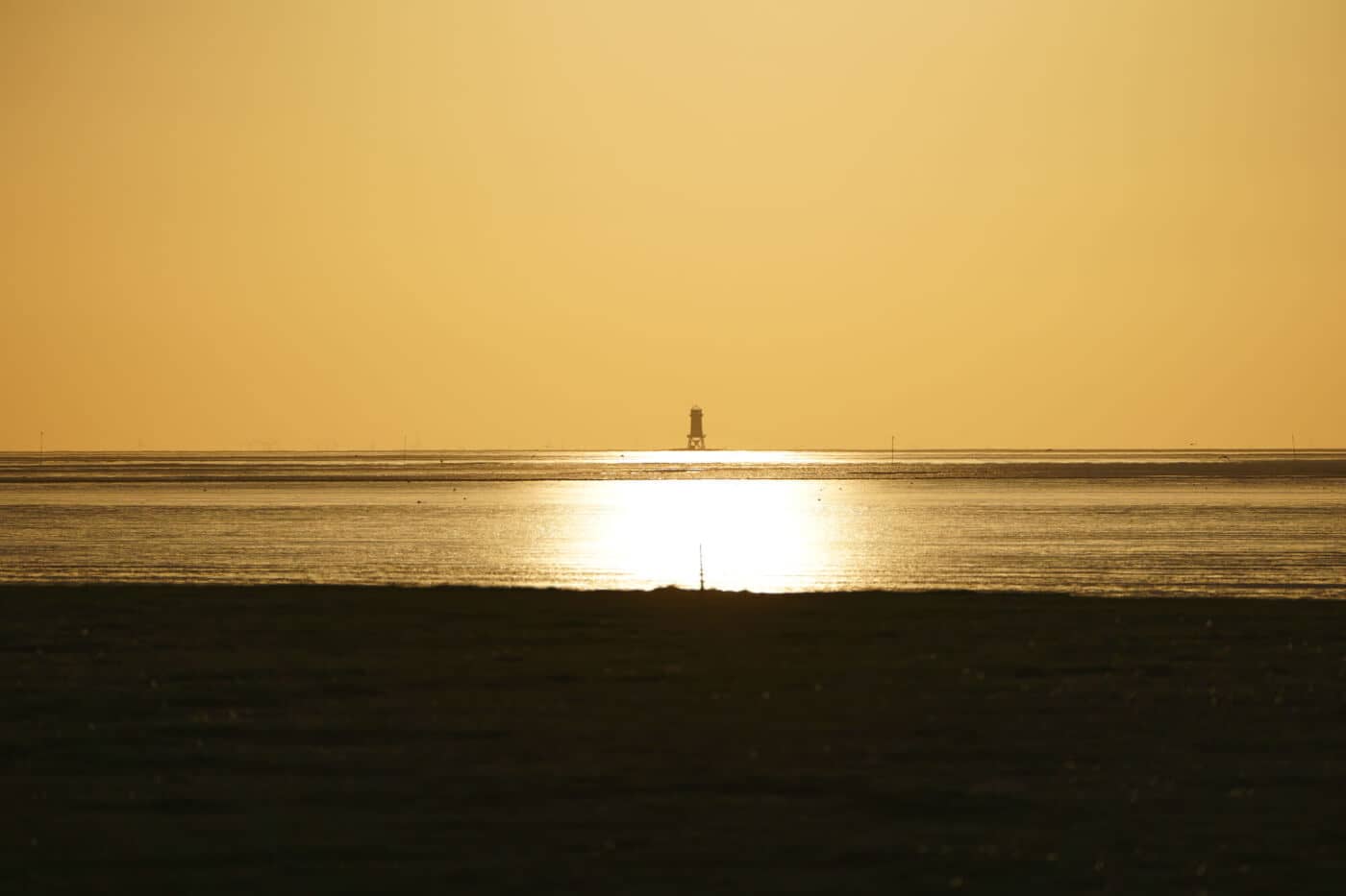 Leuchtturm Untereversand im Sonnenuntergang